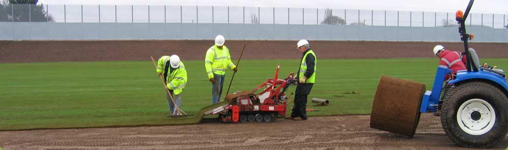 Big Roll turf laying on a new construction rugby pitch at HMP Featherstone.